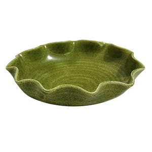 May include: A set of three ceramic mugs with a speckled, matte finish. The mugs are in shades of cream, light gray, and dark gray. Each mug has a simple, minimalist design, perfect for coffee or tea.