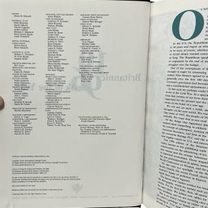 May include: An open book with text on the right page and a list of staff on the left. The text includes a large letter "O" and discusses the Republican party and the Cold War.