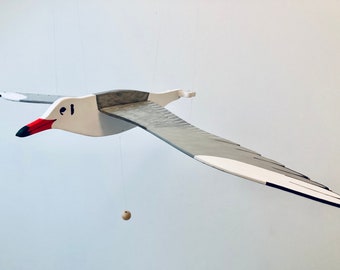 Articulated wooden mobile of a Black-headed Gull. Completely handmade. Baby room or living room. Ideal birth gift.