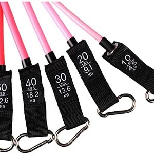 May include: A set of five resistance bands in varying strengths for exercise. The bands are pink and black, with silver carabiner clips. Each band has a black label indicating the resistance in pounds and kilograms, ranging from 10 lbs (4.5 kg) to 50 lbs (22.6 kg).