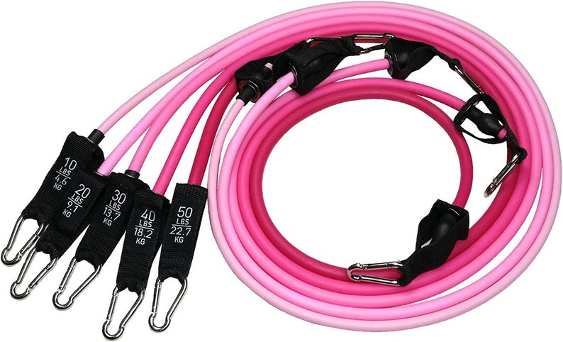 May include: A set of pink resistance bands with black fabric handles and silver metal clips. The bands are in shades of pink, with labels indicating resistance levels from 10 lbs to 50 lbs. The bands are designed for exercise and fitness.