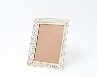 Beautiful, delicate brass frame (6x12 cm) with lovely ornamentation and curved glass – Scandinavia/Denmark – rotatable stand (26-0029)