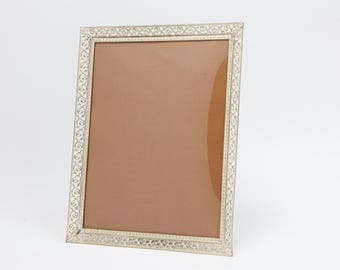 Beautiful, delicate brass frame (18x24 cm) featuring whimsical ornamentation and curved glass; "Hygge" style photo frame (26-0043)