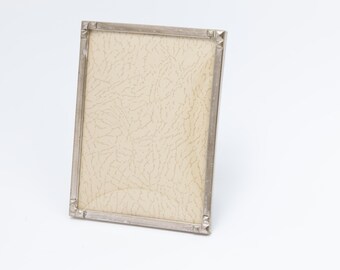 Art Deco silver-plated frame / silver-plated brass, curved glass, 9x12 cm, Art Deco / Historicism style,  square ornamentation (26-0038)
