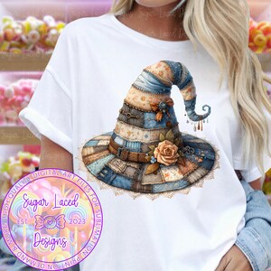 May include: A whimsical witch hat design with a patchwork pattern in shades of blue, tan, and cream. The hat features a brown belt, a rose, and decorative elements. The image includes the text "Sugar Laced Designs" and "EST. 2023".