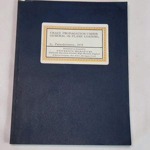 May include: A dark blue book with a white and gold label. The label reads "CRACK PROPAGATION UNDER GENERAL IN-PLANE LOADING." The author's name and the year 1972 are also visible. Published by University Microfilms.