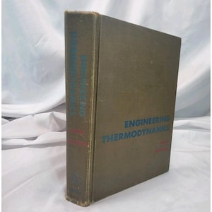 May include: A vintage hardcover book titled "Engineering Thermodynamics" in olive green. The title and author's name are printed in blue. The book's spine displays the title vertically.