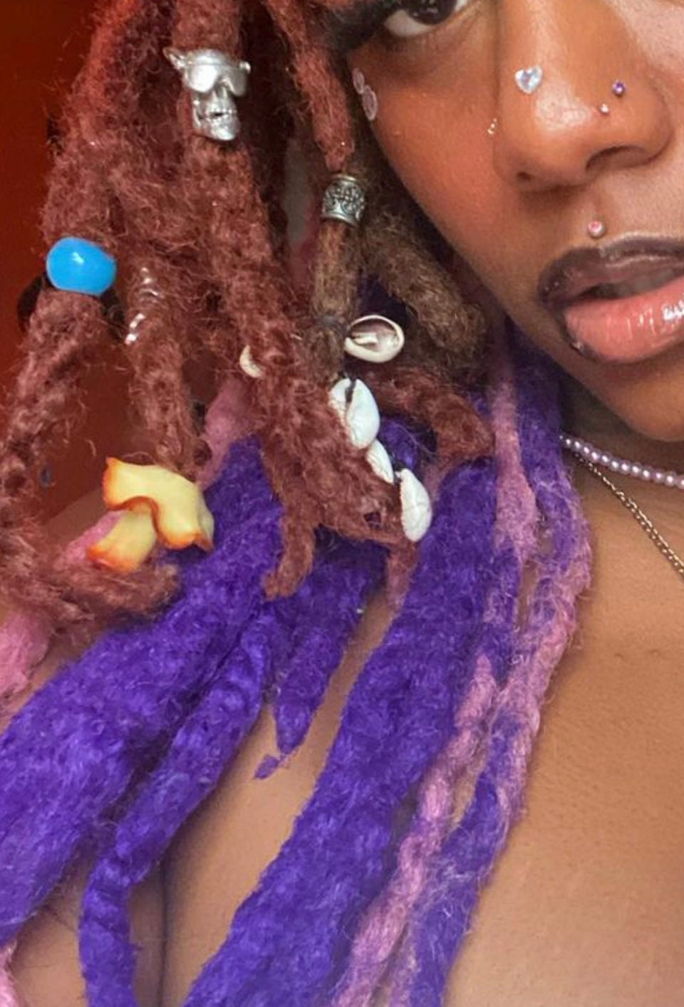 First post came out weird:: I love adding loc accessories to change my look  up a bit. What accessories do yall add? I love the beads and shells : r/ Dreadlocks