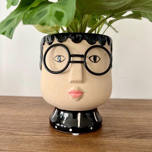 Hand painted ceramic face planter