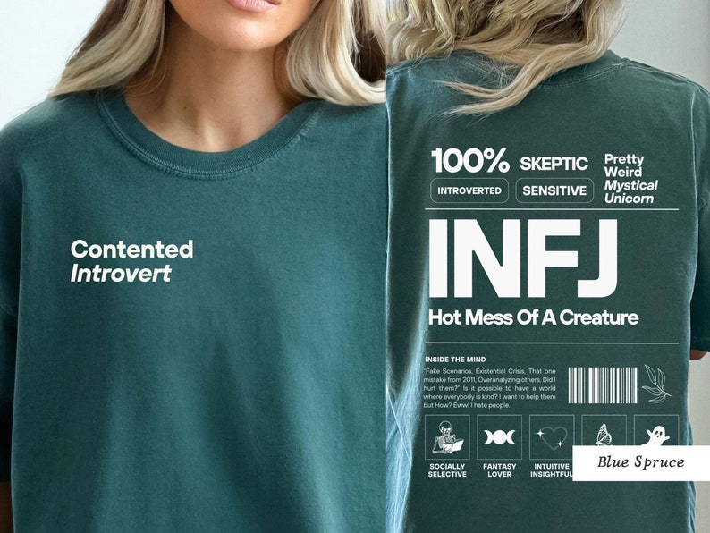 May include: A teal green t-shirt with the text "Contented Introvert" on the front and "100% Skeptic Introverted Sensitive Pretty Weird Mystical Unicorn INFJ Hot Mess Of A Creature" on the back. The back of the shirt also includes a graphic with the text "Inside the Mind" and icons representing "Socially Selective", "Fantasy Lover", "Intuitive Insightful", and "Blue Spruce".
