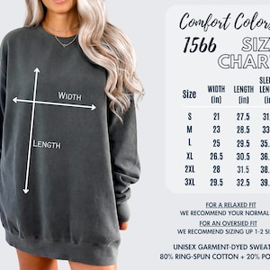 May include: A size chart for a unisex garment-dyed sweatshirt made of 80% ring-spun cotton and 20% polyester. The chart shows the width, length, and sleeve length in inches for sizes S through 3XL.