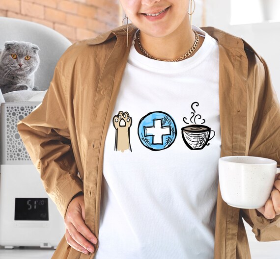 A cute t-shirt for a health worker who loves coffee and cats. Nurse who loves cat and coffee tee, gift for nurse, nurse cat mama tee, unisex