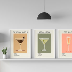 Three framed cocktail prints (Espresso Martini, Dirty Martini, French 75) displayed on a white shelf with minimalist décor, adding a stylish and sophisticated touch.