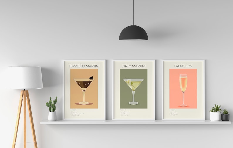 Three framed cocktail prints (Espresso Martini, Dirty Martini, French 75) displayed on a white shelf with minimalist décor, adding a stylish and sophisticated touch.