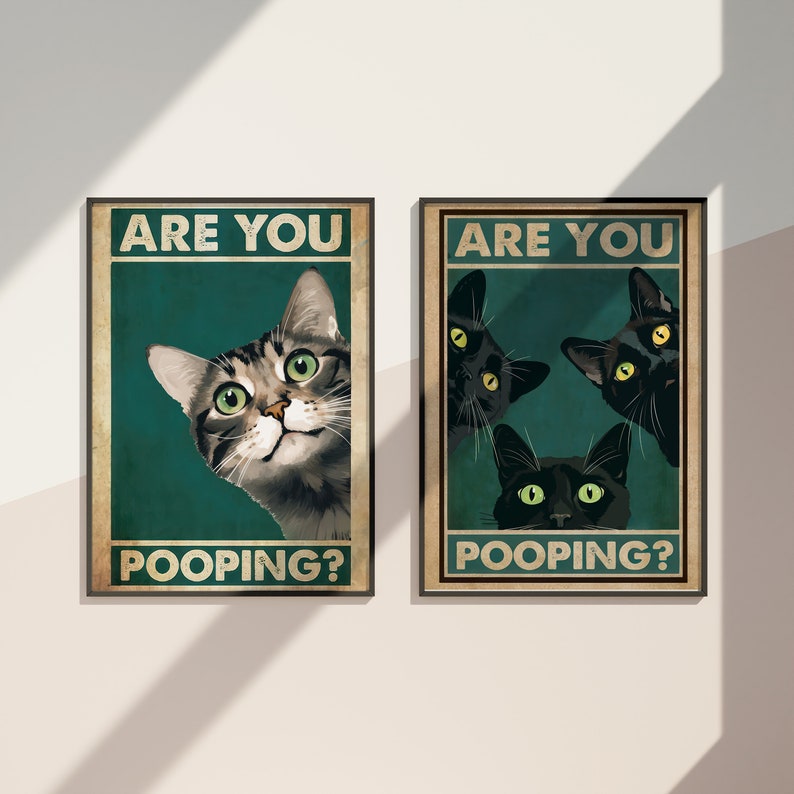 May include: Two vintage-style posters with the text "Are you pooping?" and images of cats. The poster on the left features a tabby cat looking over its shoulder. The poster on the right features three black cats looking over their shoulders.