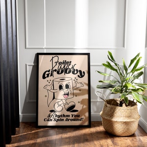 Vintage-inspired wall art featuring a cartoon character next to a potted plant with a retro poster saying 'Toilet Paper Groovy - A Rhythm You Can Spin Around' in a room with wooden floors and rattan baskets