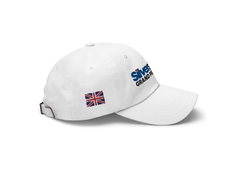 May include: White baseball cap with a blue and black embroidered logo that says "Silverstone Grand Prix" and a small embroidered Union Jack flag.