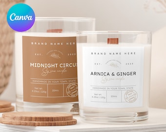 Pode incluir: Dois frascos de vela de vidro com tampas de madeira e etiquetas. As etiquetas são marrons com texto dourado e apresentam o nome da marca "BRAND NAME HERE", o aroma da vela e detalhes como "Vela de cera de soja", "Feito à mão na sua cidade, estado", "Peso líquido 4.23oz | 120g" e "20Hrs". Os aromas são "Midnight Circus" e "Arnica & Ginger".