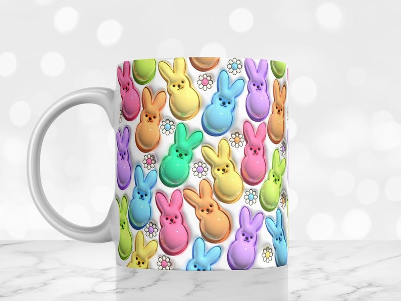 May include: White ceramic mug with a colorful pattern of pastel-colored bunny shapes and white flowers.