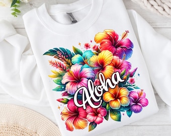 May include: White sweatshirt with a colorful floral design and the word "Aloha" in a stylized font. The flowers are pink, yellow, orange, blue, and green.