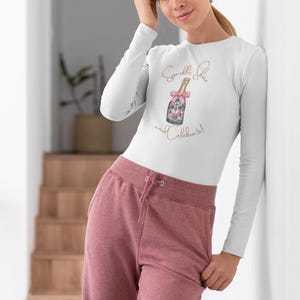woman wearing holiday Sparkle Shine and Celebrate long sleeve t-shirt perfect for daughter or cousin gifts