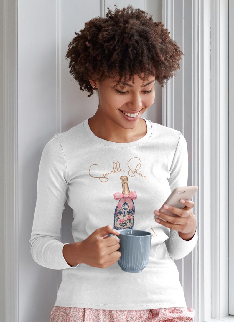 woman wearing holiday Sparkle Shine and Celebrate long sleeve t-shirt perfect bachelorette party shirts feel good shirt for women