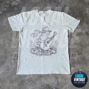 Frog Musicians 90s Retro Shirt, Vintage Frog Guitar Graphic Shirt, Cute Funny Frog Tee, Frog Lovers Cotton Tee, Unisex Beige Shirt,