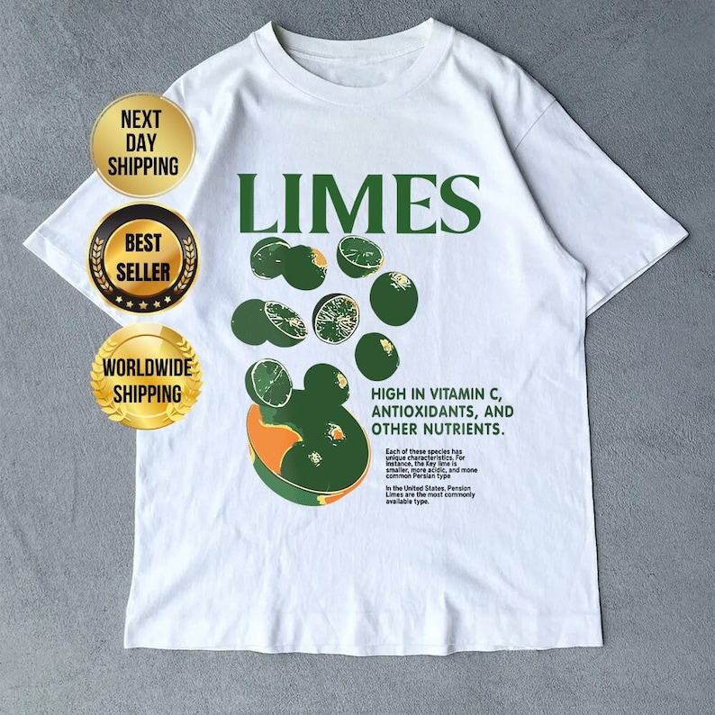 May include: White t-shirt with a green graphic of limes and the word "LIMES" in large green letters. The text "HIGH IN VITAMIN C, ANTIOXIDANTS, AND OTHER NUTRIENTS" is also printed on the shirt.