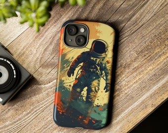 May include: A phone case featuring a colourful illustration of an astronaut in a space suit, standing on a planet with a yellow and orange background.