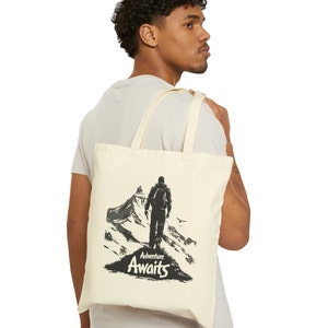 Mountain Majesty: Hiker Facing the Peaks - Nature Lover Tote Bag for Adventure Enthusiasts Cotton Canvas Tote Bag