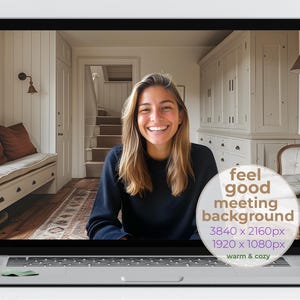 May include: A woman in a black shirt is on a video call. The background is a warm and cosy hallway with white walls and a wooden floor. The text on the screen says "feel good meeting background 3840 x 2160px 1920 x 1080px warm & cosy".