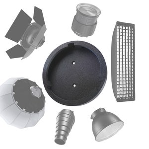 May include: A set of photography lighting accessories including a black reflector, a white diffuser, a grid, a black speed ring, a black speed ring adapter, a black honeycomb grid, and a black snoot.
