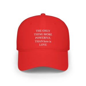 The Only Thing More Powerful Than Hate Is Love cap embroidered quote hat lo mas poderoso que el odio es el amor benito quote halftime UNISEX