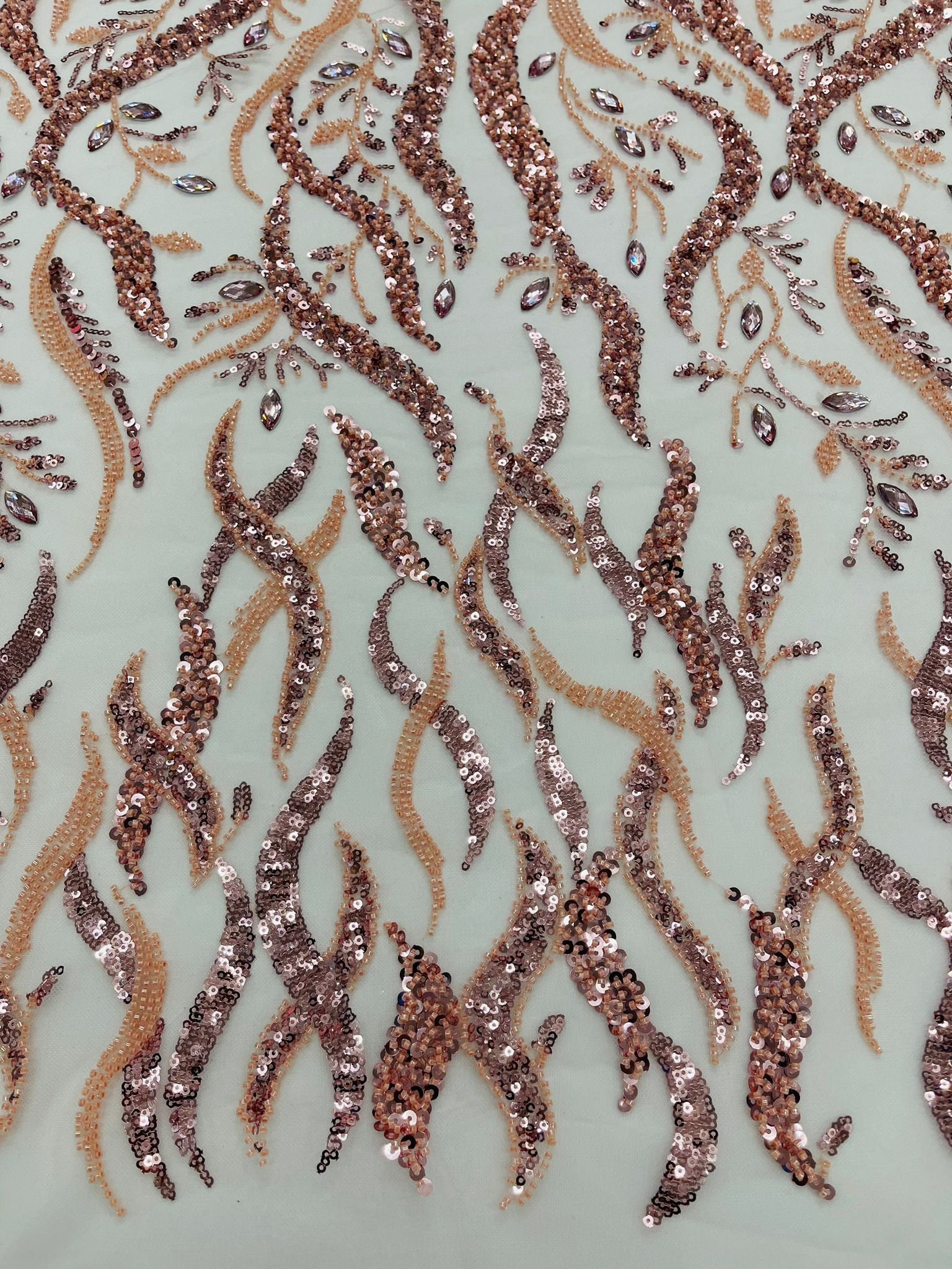 White Vine Design Embroider and heavy beading on a mesh lace-sold by the yard.