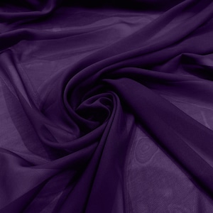 May include: A close-up of a deep purple sheer fabric, showing the texture and drape of the material.