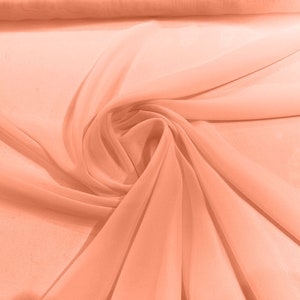 Tessuto chiffon morbido, leggero, trasparente e trasparente al 100% poliestere. 58/60" di larghezza, venduto tagliato su misura - Pesca scura