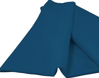 May include: A folded piece of teal blue tissue paper.