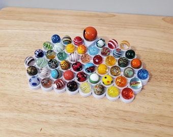Expositor de canicas de imitación de piedra para canicas de hasta 19 mm y lanzador de 2,54 cm. (Canicas no incluidas).