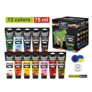 Puede incluir: Un conjunto de 12 tubos de pintura acrílica en varios colores, incluyendo verde, azul, negro, marrón, blanco, amarillo, rojo y oliva. Cada tubo está etiquetado "Art Kompozit Acryl Pro" y contiene 75 ml de pintura. El conjunto está empaquetado en una caja con una ilustración colorida de una mujer con cabello verde. La caja también incluye el texto "Art Kompozit Do what inspires" y "Pintura acrílica Acryl Pro 12 colores".