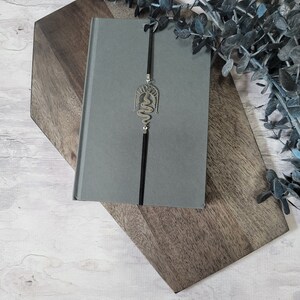 Snake in an Arch Stainless Steel Bookmark