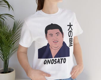May include: White t-shirt with a cartoon illustration of a sumo wrestler with the text "ONOSATO" and "大の番" in Japanese.