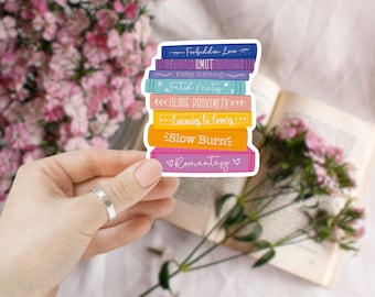 Pegatinas con clichés de libros románticos, pila de libros coloridos