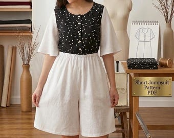 May include: A woman models a short jumpsuit sewing pattern. The top is black with white polka dots, and the shorts are white. The text reads "NEW - SHORT JUMPSUIT - SEWING PATTERN - SIZES XS-3XL" and "Short Jumpsuit Pattern PDF".