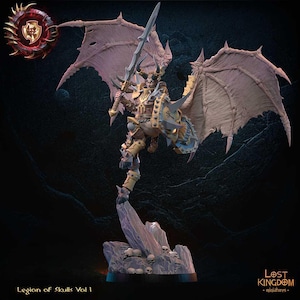 May include: A detailed miniature figure of a winged demon with a sword and shield. The demon is painted in gold and brown tones and is standing on a rocky base with skulls. The miniature is part of the Legion of Skulls Vol 1 collection from Lost Kingdom Miniatures.