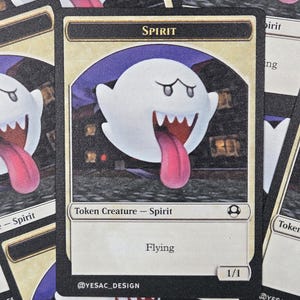 May include: A Magic: The Gathering card featuring a white ghost with a pink tongue and a black background. The card text reads "SPIRIT, Token Creature - Spirit, Flying, 1/1". The card is designed by @YESAC_DESIGN.