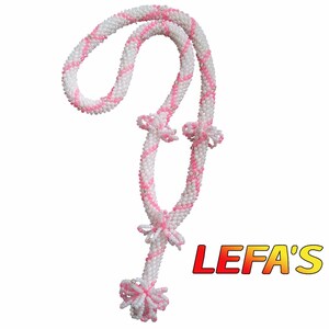 May include: A beaded necklace featuring a white and pink spiral pattern with small decorative bows along the length and a tassel at the bottom. The text LEFA'S is displayed in red and yellow letters to the right of the beaded accessory.