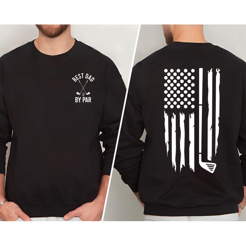 Peut inclure: Sweat-shirt noir avec un motif blanc sur le devant qui dit "Best Dad By Par" avec deux clubs de golf crois&eacute;s. Le dos du sweat-shirt pr&eacute;sente un motif blanc d'un drapeau am&eacute;ricain avec des balles de golf dans le champ bleu et un club de golf dans la bande rouge.