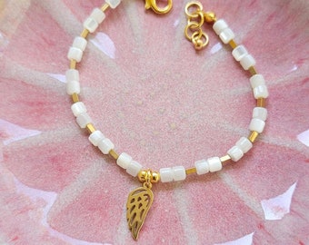 White Crystal Beaded Bracelet with Angel Wing Charm