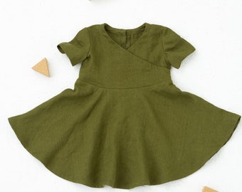 PDF Sewing Pattern for short Sleeve Dress Bella. Ruffled Dress with crossed front for the Girls in sizes from 1 month to 6 years. In English