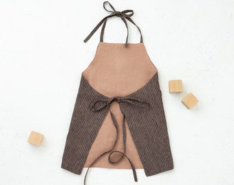 PDF Sewing pattern for reversible kids apron Hubert with a front pocket. Apron for 2-11 years child.